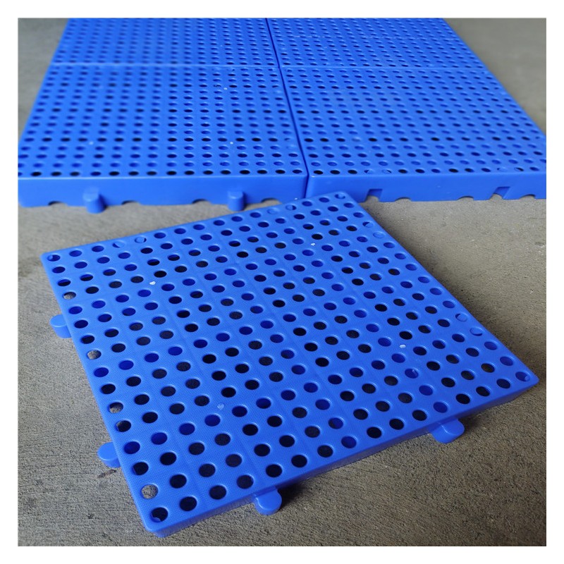 供应广西蓝色网格小垫板厂商 30*30*5CM可拼接塑料地台板批发
